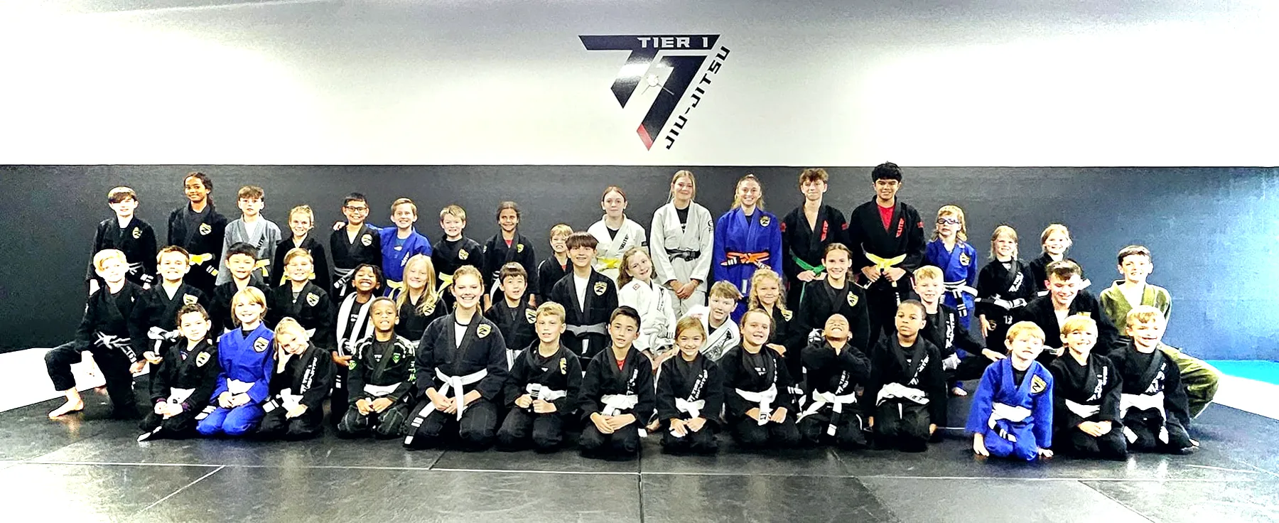 Kids class group photo at Tier 1 Jiu-Jitsu