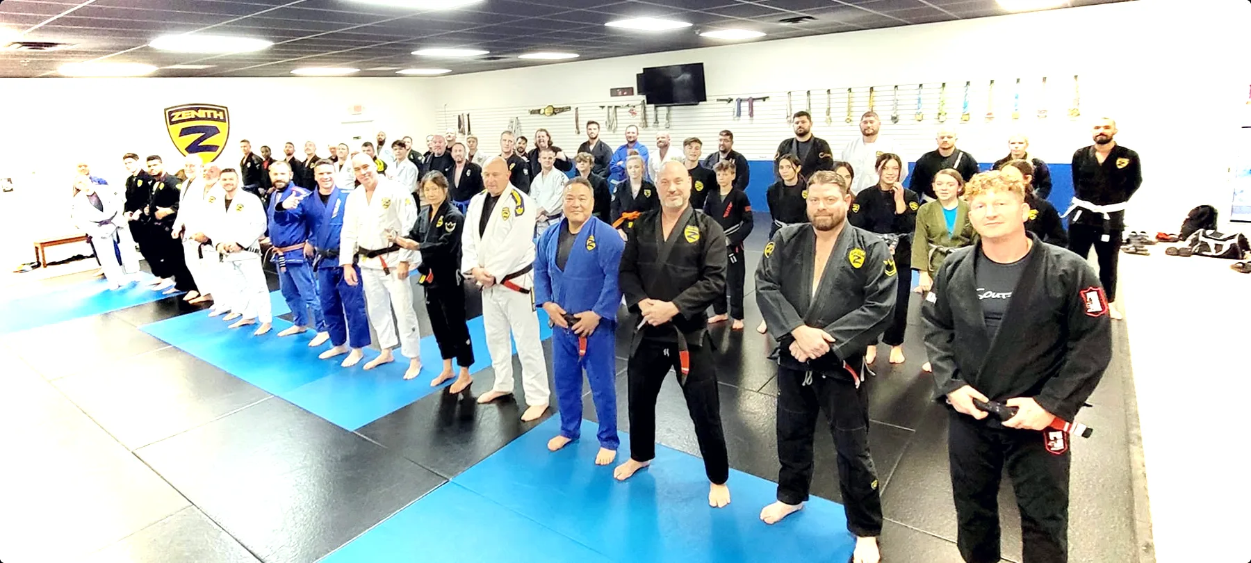 The Tier 1 Jiu-Jitsu team lined up on the mats